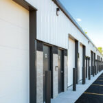 close up of white garage/storage doors on a steel building