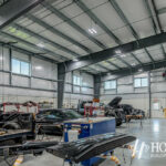interior shot of body shop garage with steel beams
