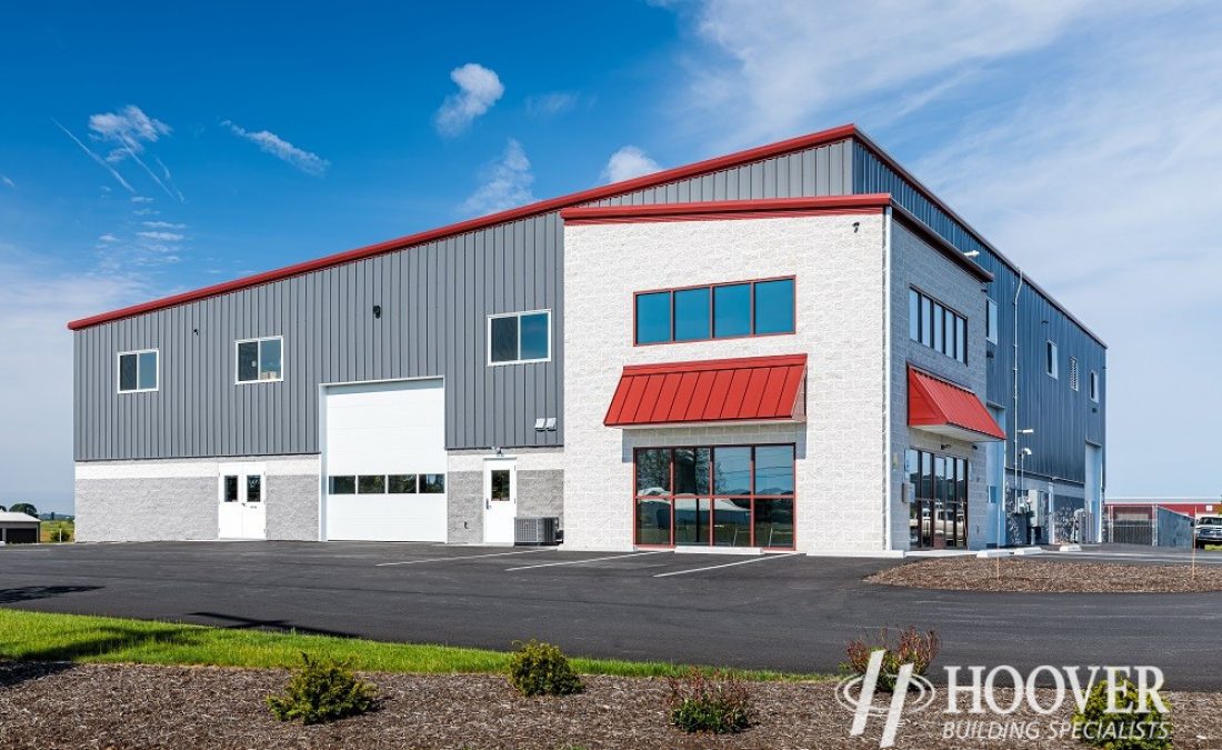 side view of large steel and stone commercial building