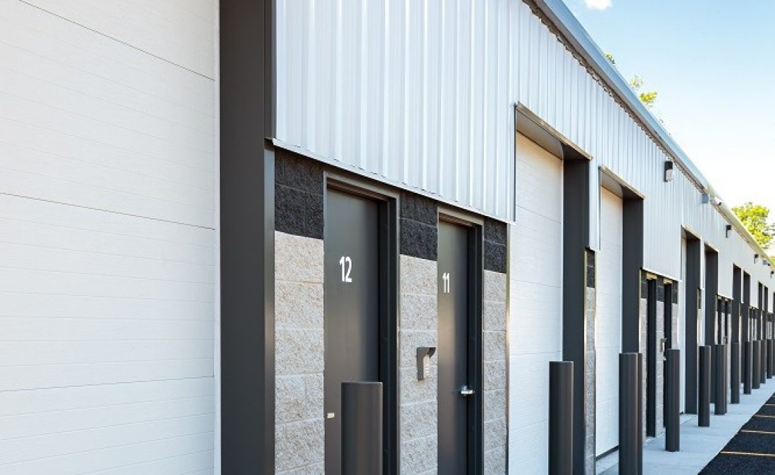 close up of white garage/storage doors on a steel building