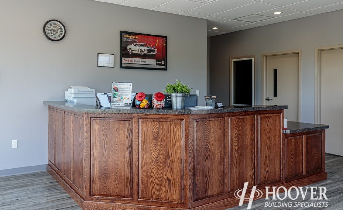 close up of wooden front desk in body shop