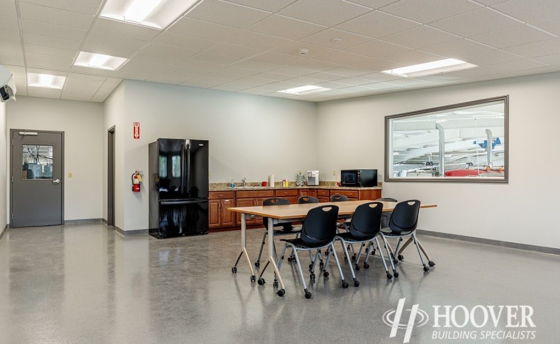 interior shot of risser poultry break room with fridge and cement floors